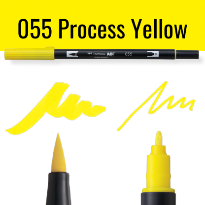 Gele Tombow ABT dual brush pen met voorbeelden van schrijfstijl op zwarte achtergrond