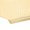 WolfA5_First Endsheet Gele notitieboekhoes met paardenpootjespatroon en Dingbats-logo