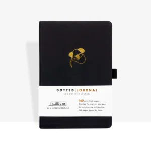 Zwart notitieboek met gouden koala-afbeelding en witte band