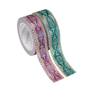 Drie rollen washi tape met gedetailleerde patronen op witte achtergrond