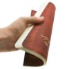 9780349714653 Mozart, The Hunt - Dot Grid - A5 - Back Rood notitieboek met goudkleurige tekst en muzieknoten op de rug