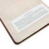 9780349714653 Mozart, The Hunt - Dot Grid - A5 - Interior 1 Inhoudsblad van een notitieboek met tekst over Mozart en The Hunt