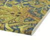 Blauw en geel notitieboek met bloemmotief en gebonden rand