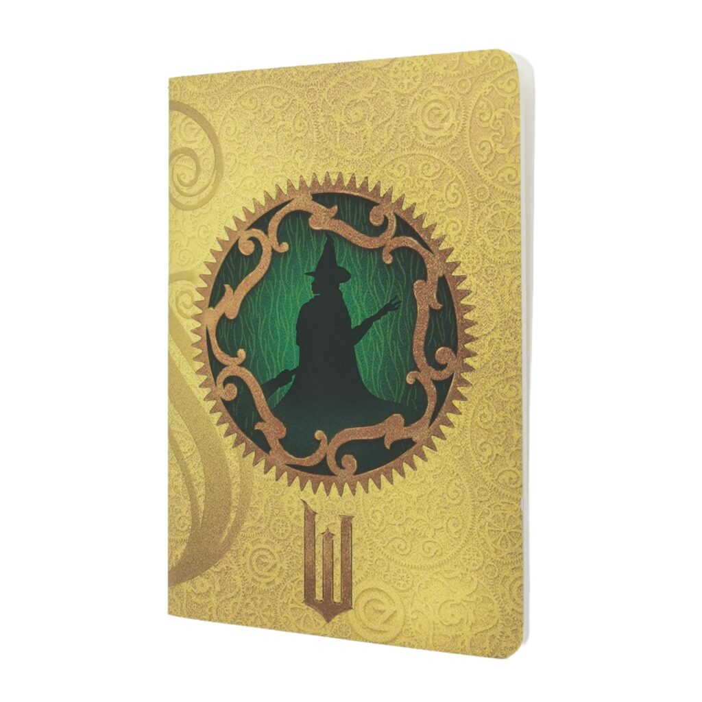 Gele notitieboek met magische silhouetillustratie op de voorkant