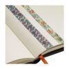 Twee washi tapes met chakra- en bloemmotieven op open notitieboek