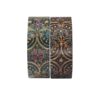 Twee rollen washi tape met gedetailleerd ornamentaal patroon op donkere achtergrond