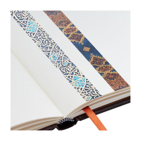 Twee washi tapes met Safavid-indigo patroon op open notitieboek