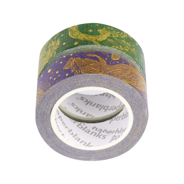 Drie rollen washi tape met paarse en groene patronen op witte achtergrond