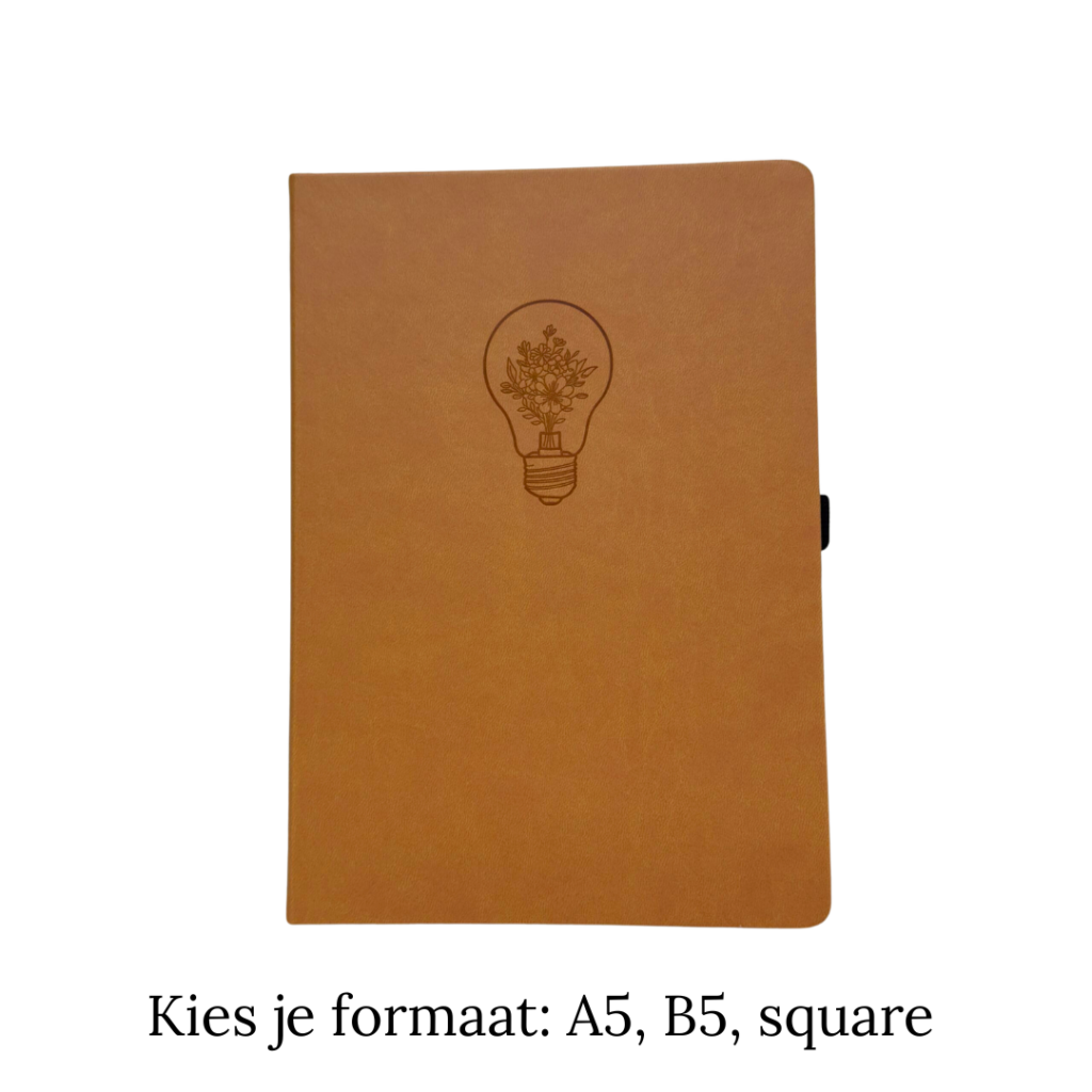 Notitieboek met lichtgevende lamp en bloemen op bruine kaft